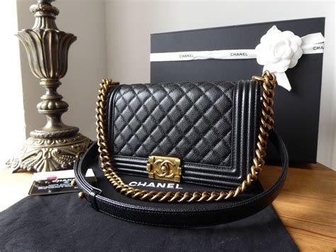 chanel black caviar old medium boy bag|BOY CHANEL .